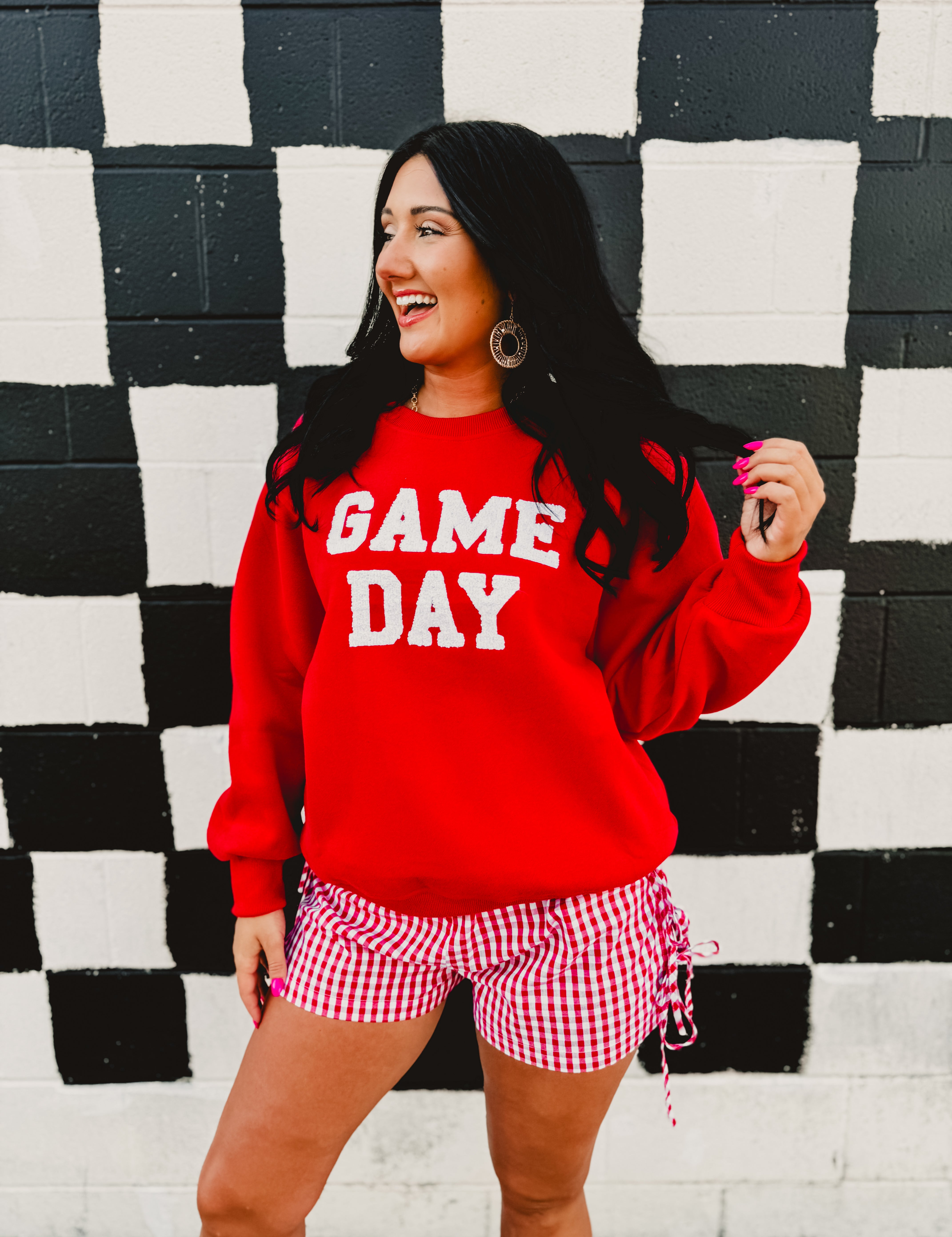 "Game Day" patch lettered red round neck sweatshirt.