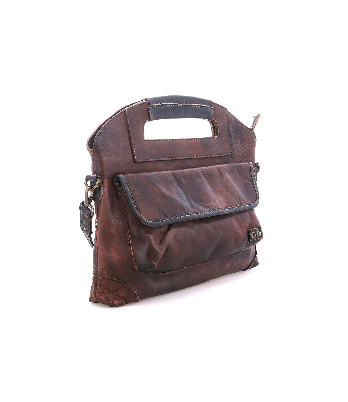 Angled view of the teak Greenway showing the cutout top handle and magnetic flap front pocket