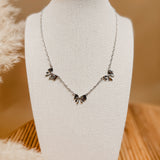 Silver Bow Pendant Necklace