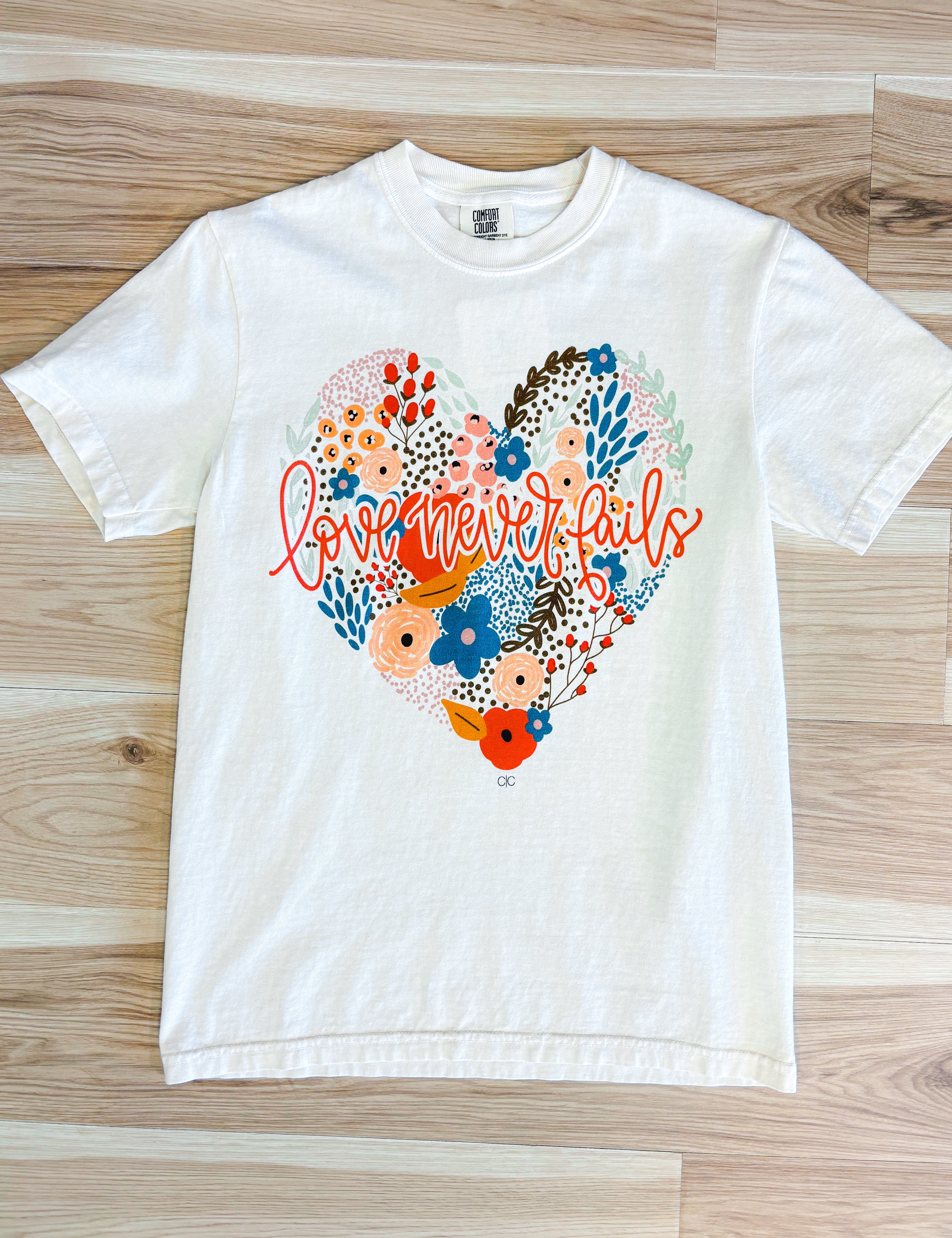Love Never Fails Graphic Tee - Ivory - Lace and Grace Boutique