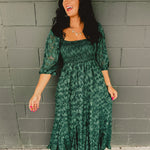 Smocked ruffled hem half sleeve square neck maxi dress.