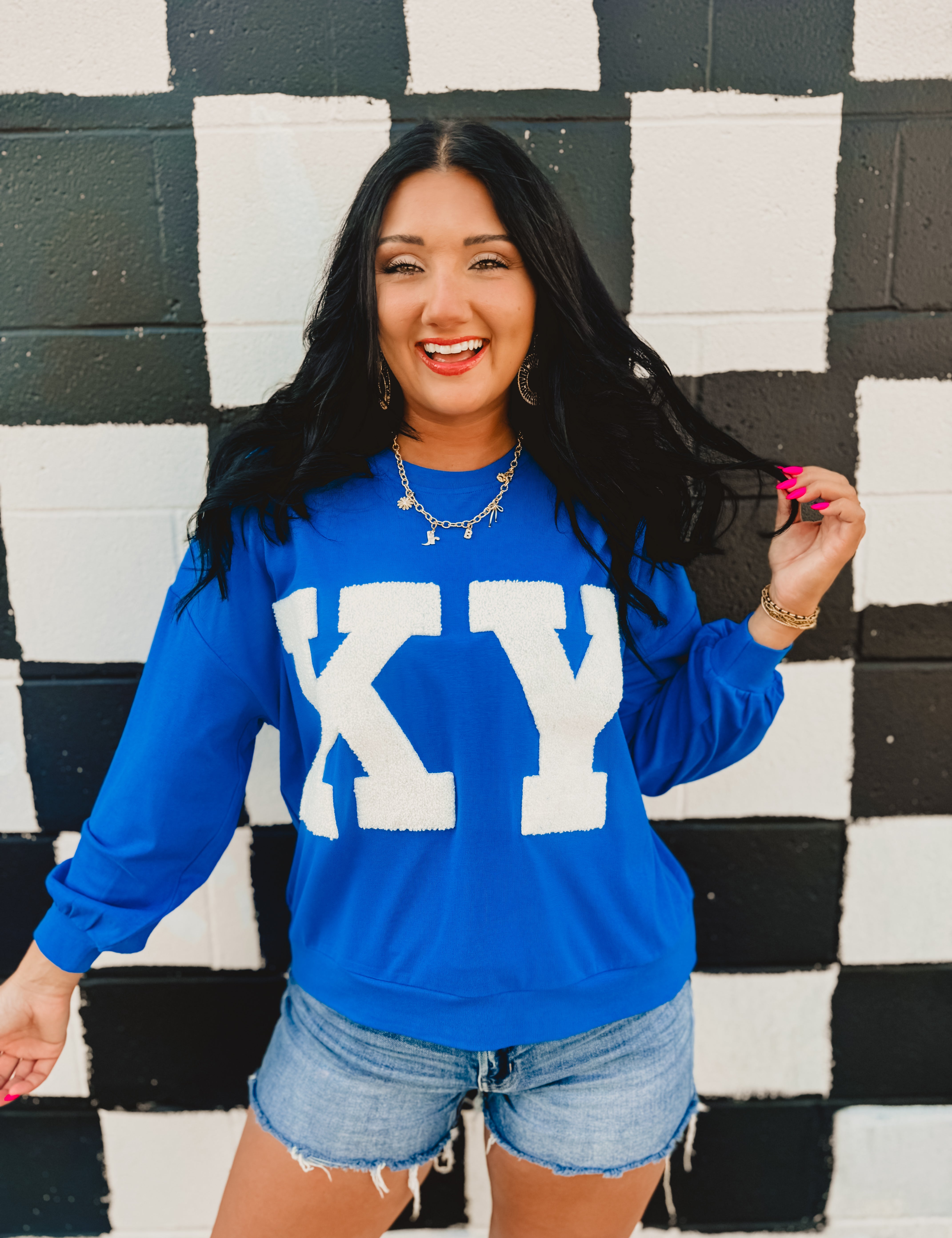 Super soft long sleeved Kentucky top that reads "KY" in patch letters.