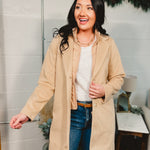 Knee length button and zip-up sports coat in Taupe.