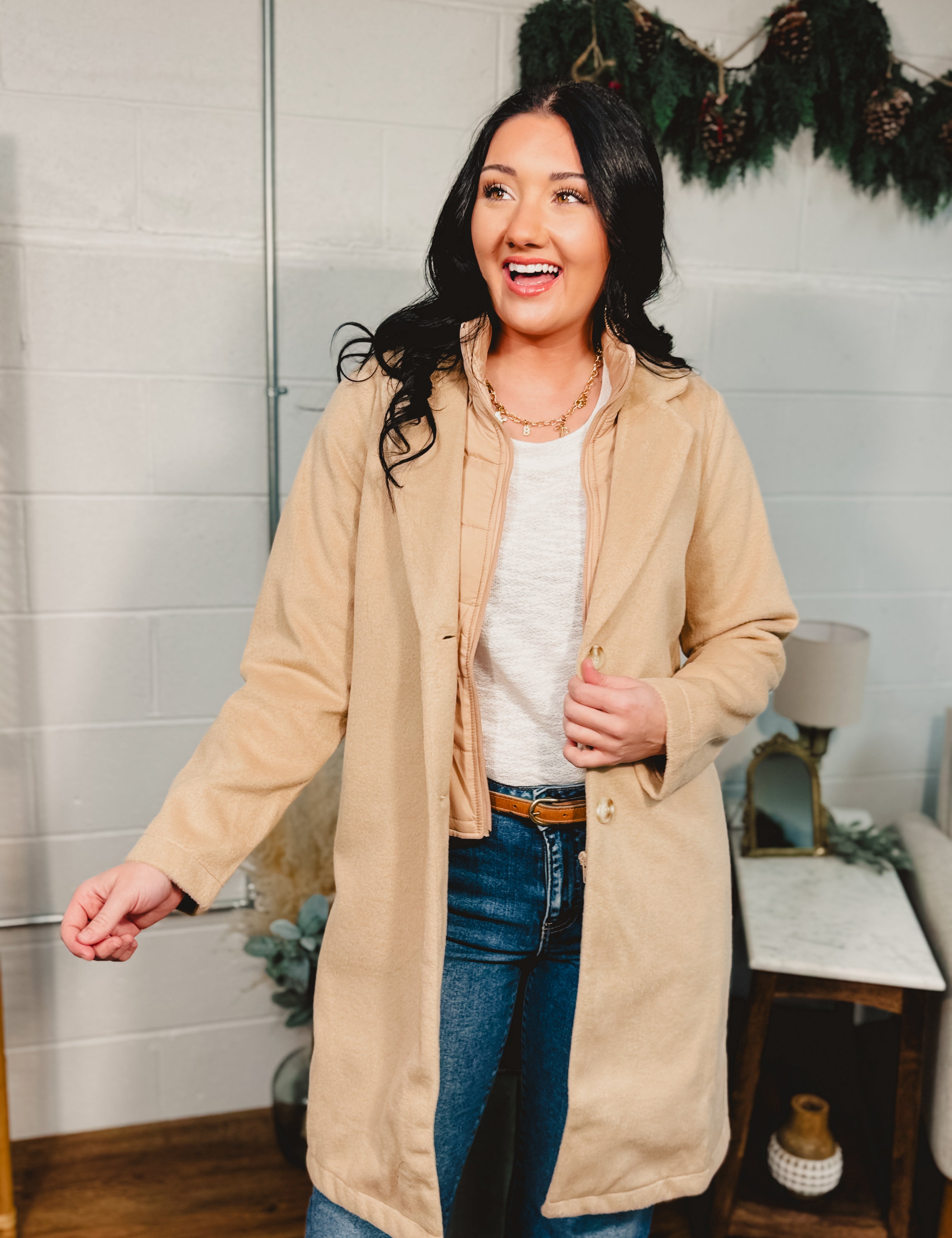 Knee length button and zip-up sports coat in Taupe.