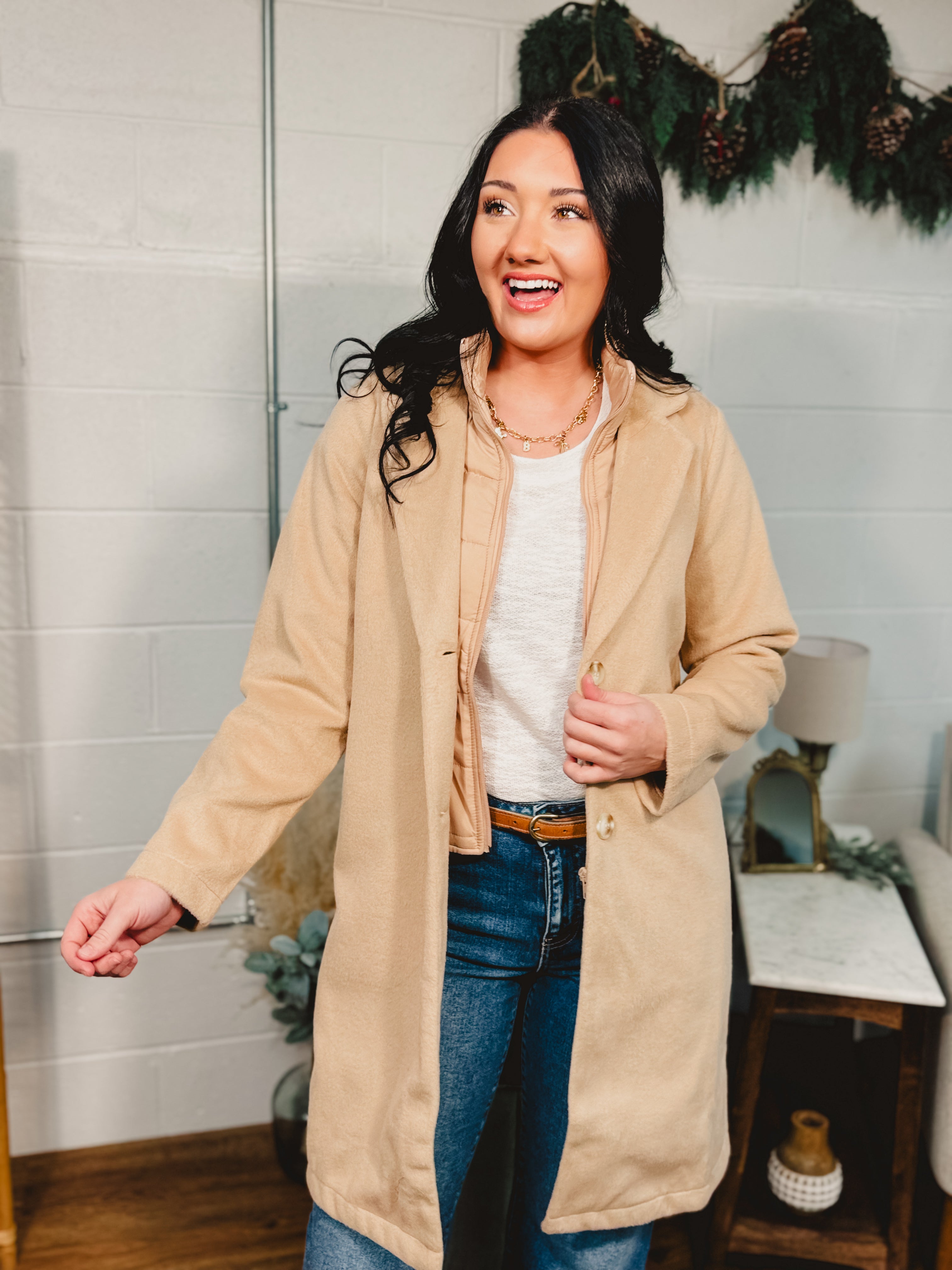 Knee length button and zip-up sports coat in Taupe.