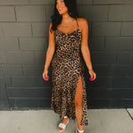 Cowl neckline spaghetti strap satin leopard print maxi dress with high side slit.