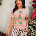 Light pink mineral washed Merry Christmas short sleeved graphic tee.