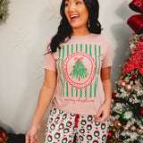 Light pink mineral washed Merry Christmas short sleeved graphic tee.