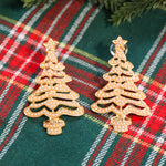 Pearl accented Christmas tree drop earrings in gold.