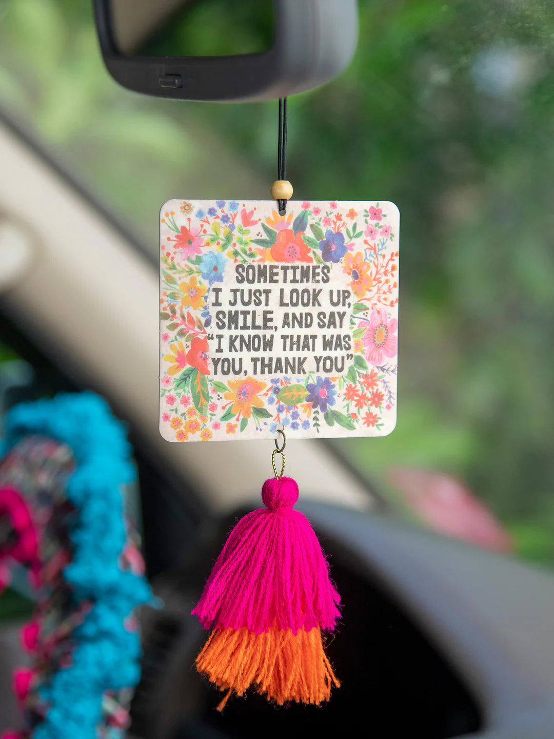 Natural Life faith-based car air freshener in the scent Strawberry with double sided artwork and tassels.