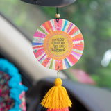 Natural Life "Stay close to people who feel like sunshine" hanging air freshener with wooden bead accent and tassels in lemon scent.