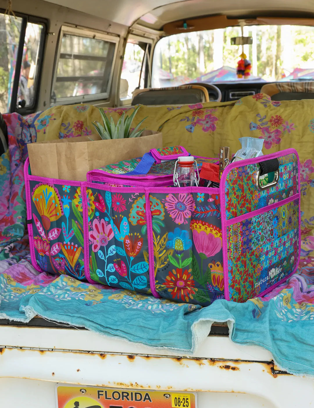 Natural Life car trunk organizer featuring three different compartments and a removable insulated cooler in Navy Folk Flower.