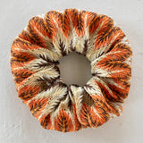 Natural Life burnt orange multi scrunchie ponytail holder.