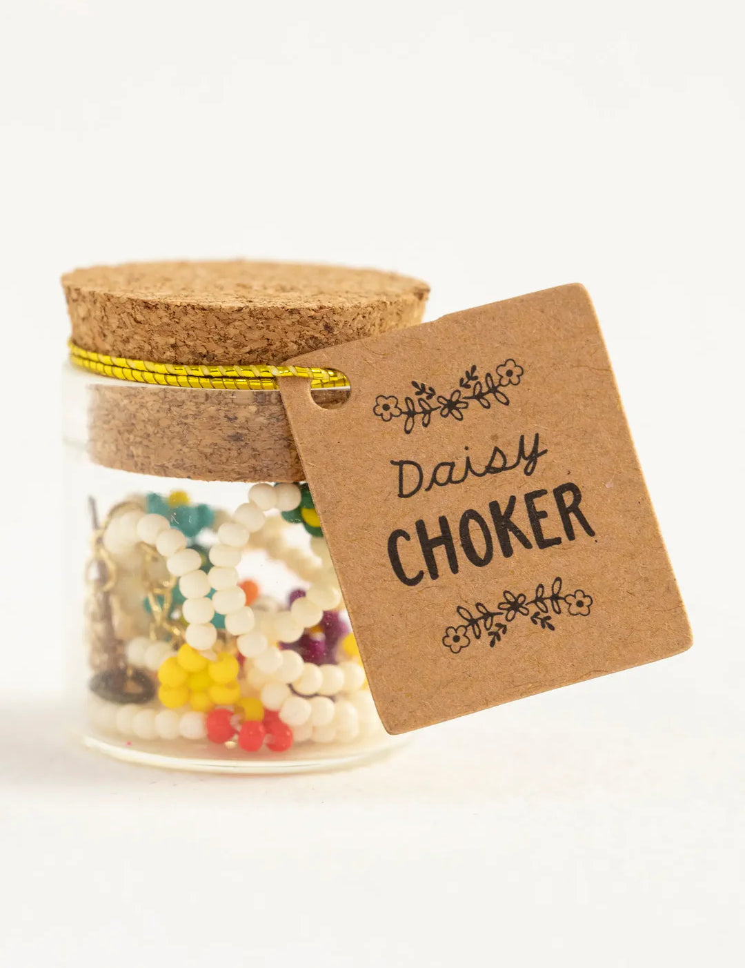 Natural Life multicolor daisy choker in little glass and cork jar.