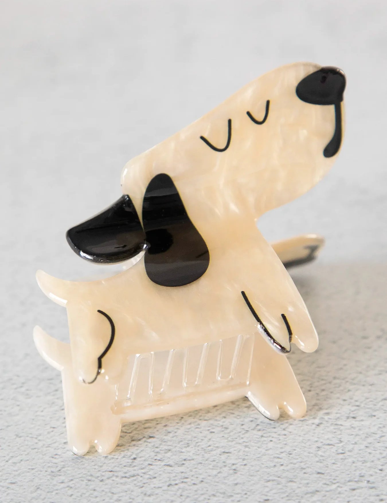 White dog Natural Life hair claw clip.