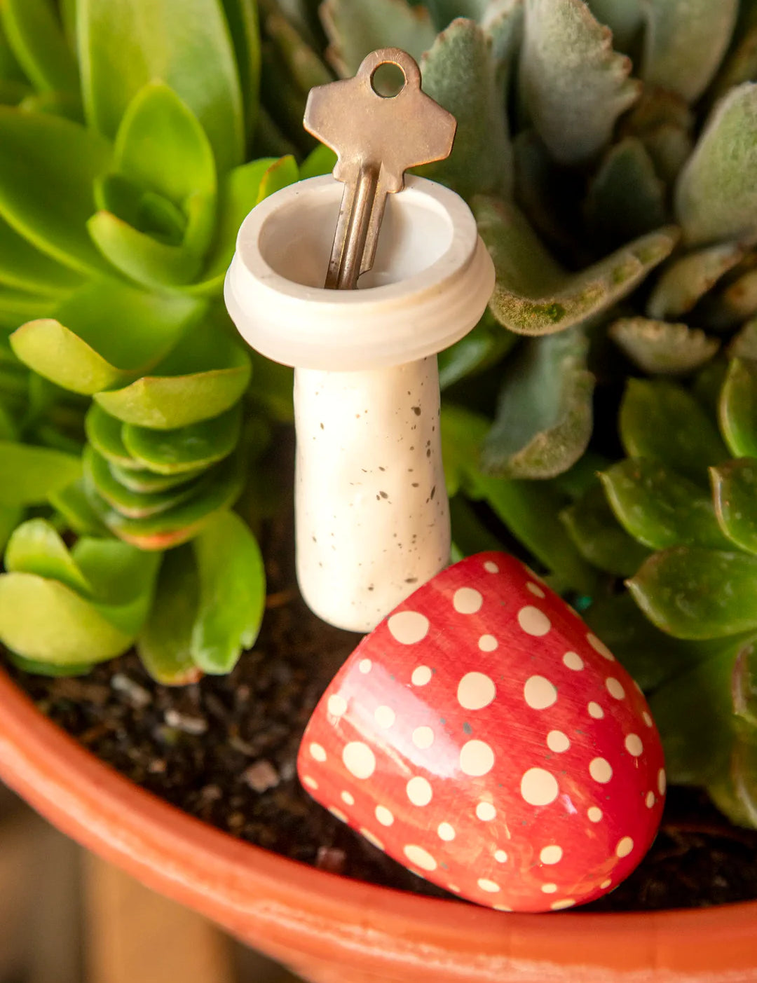 Ceramic mushroom with removable top for secret key storage by Natural Life.
