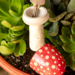 Ceramic mushroom with removable top for secret key storage by Natural Life.