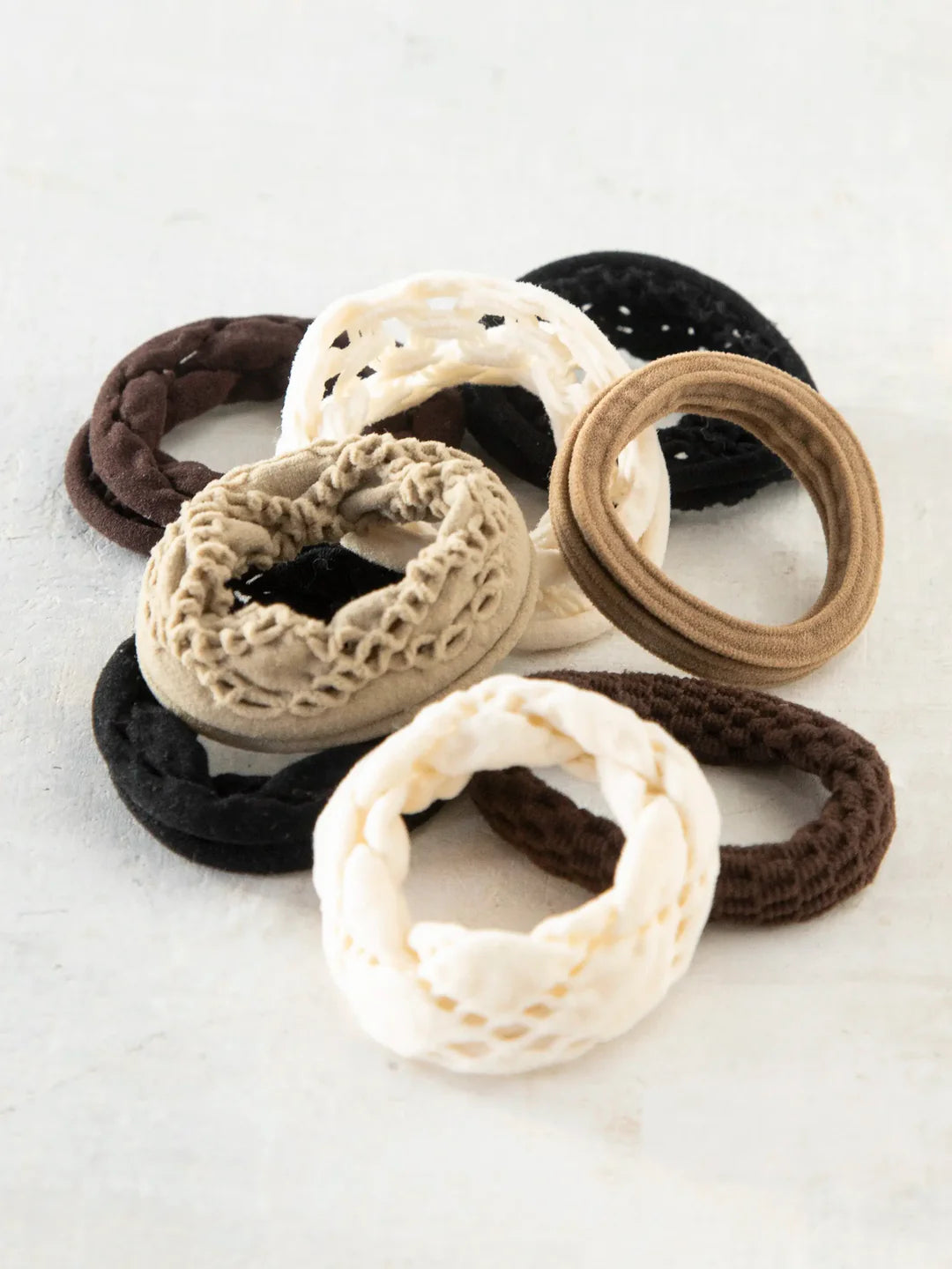 Set of 8 stretchy hair ties by Natural Life.