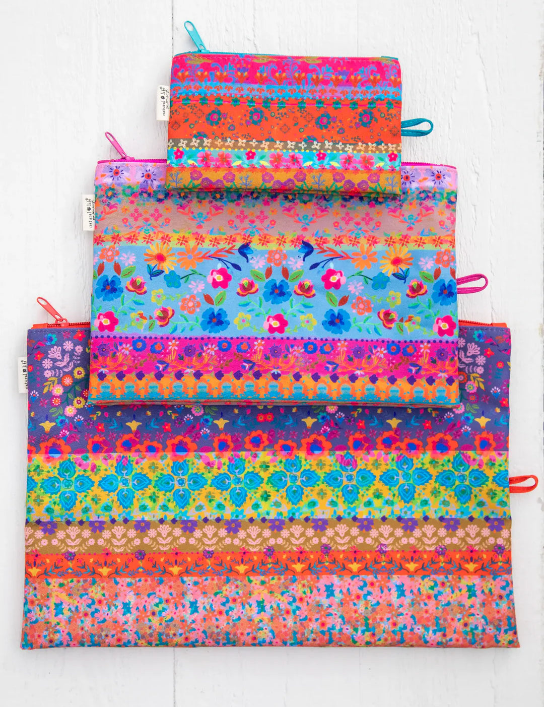 Set of three colorful storage bags by Natural Life.