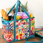 Reusable grocery tote in bright floral by Natural Life.