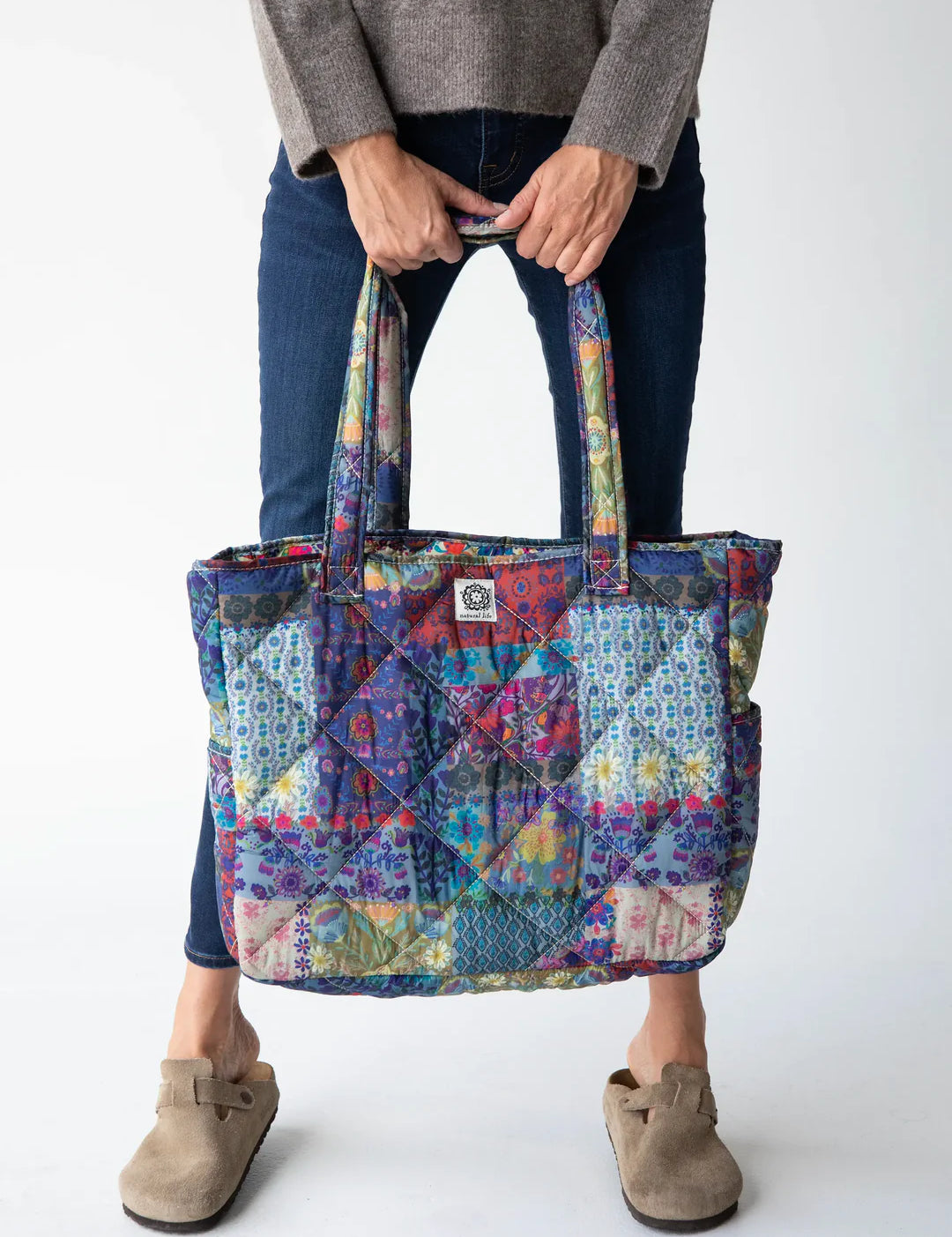 Colorful reversible puffy tote bag by Natural Life.