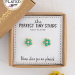 Gold plated turquoise daisy stud earrings by Natural Life.
