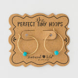 Gold hoop earrings with turquoise beads by Natural Life.