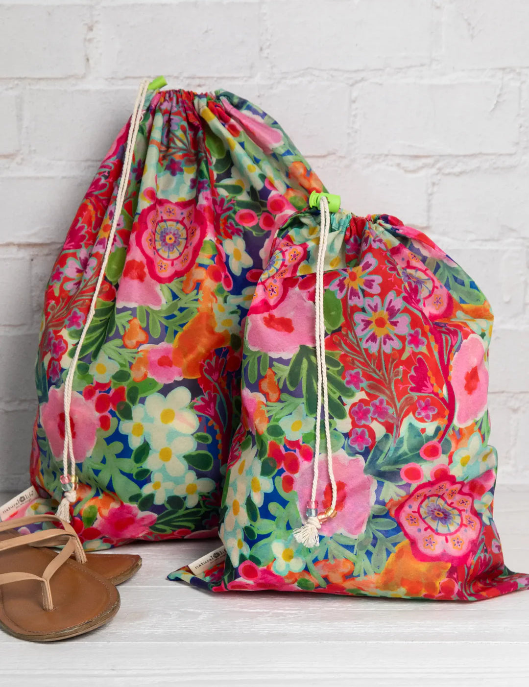 1 large, 1 small travel floral printed laundry bags with drawstring closure by Natural Life.