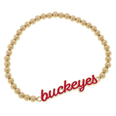 Ohio State gold beaded bracelet with "buckeyes" red charm.