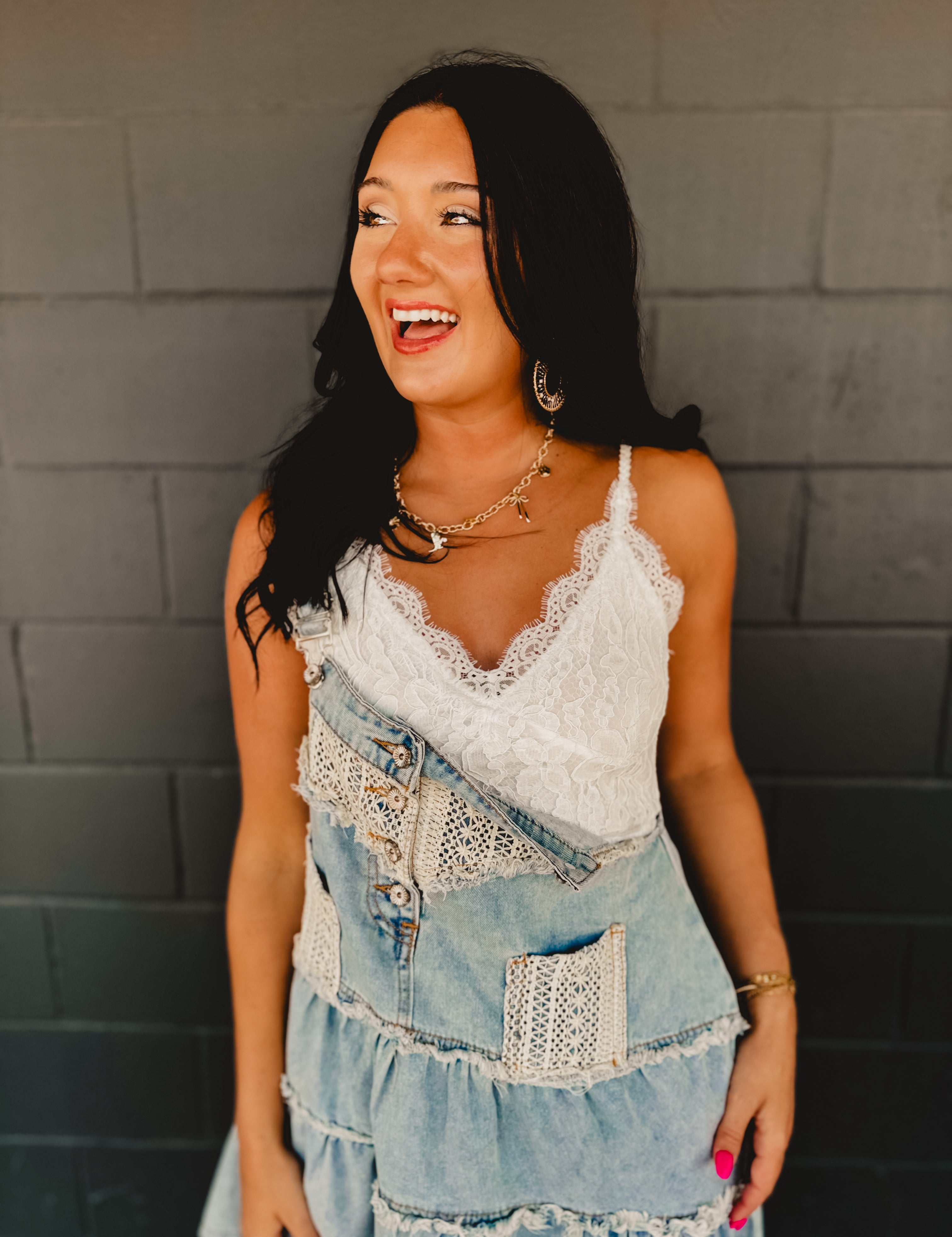 Cropped v-neck sleeveless crochet bodice tank with intricate lace detail.