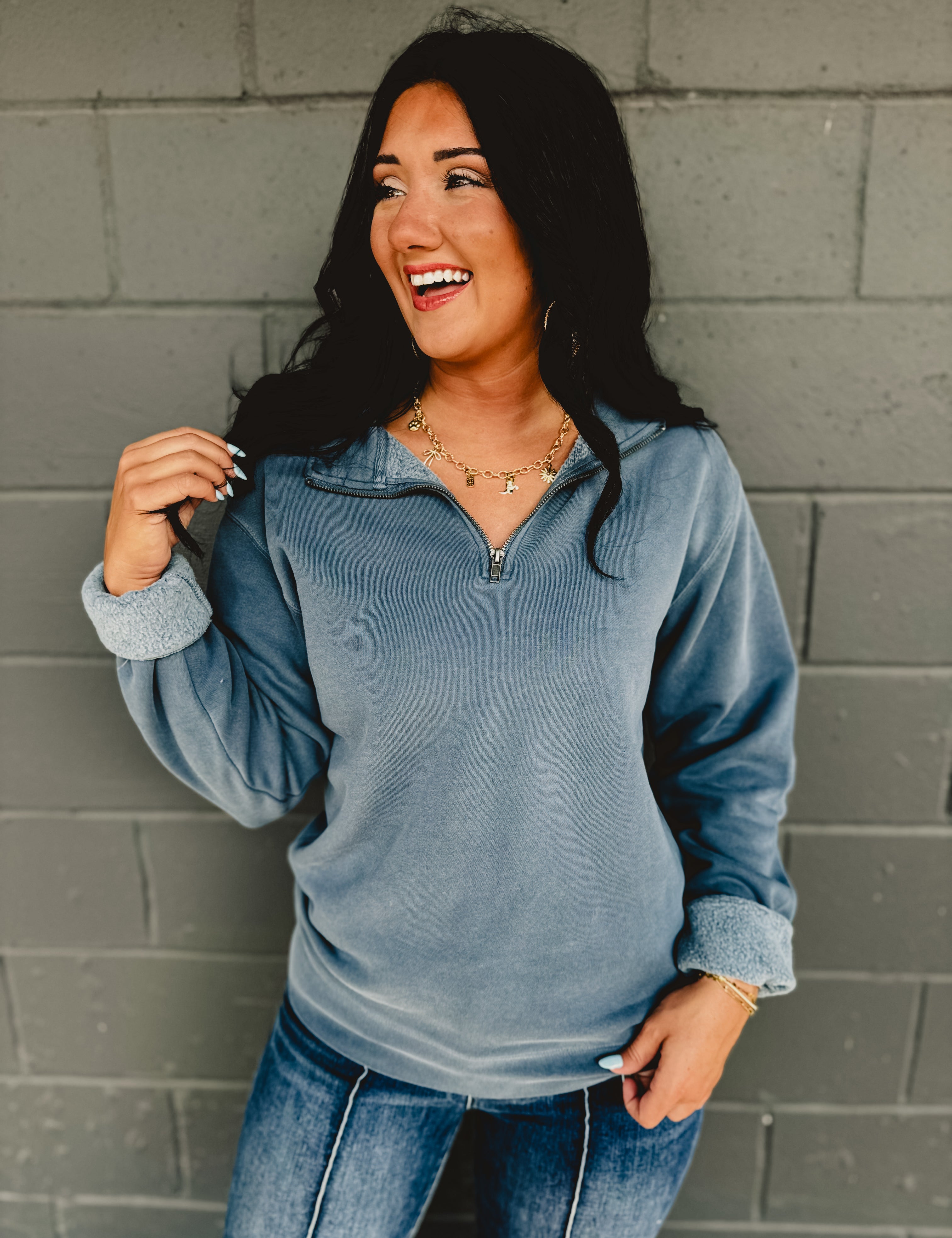 Long sleeve zip-up blue pigment-dyed pullover.