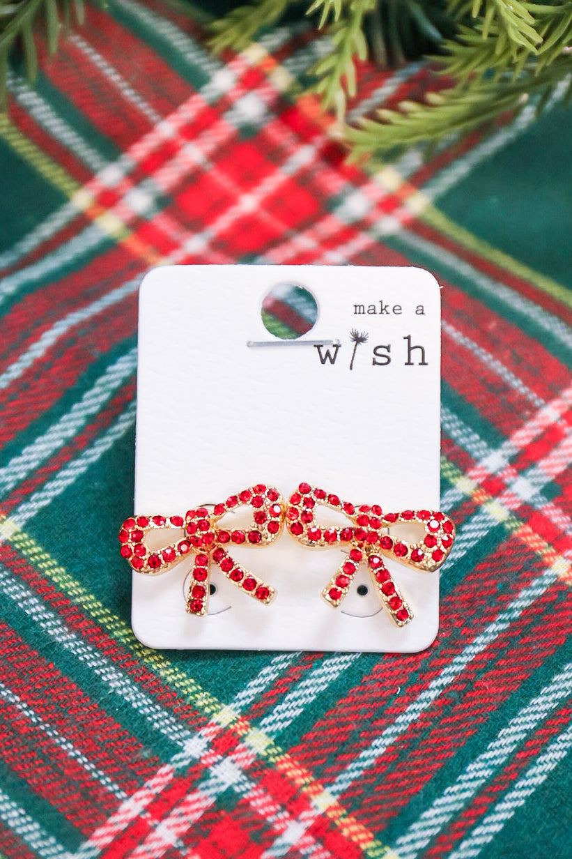 Rhinestone studded bow earrings.