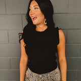 Ruffle edged black ribbed full length sweater tank top.