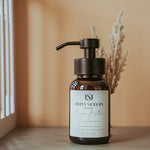 Simply Modern Cocoa Butter Cashmere Foaming Hand Soap in an amber glass 8-ounce bottle.
