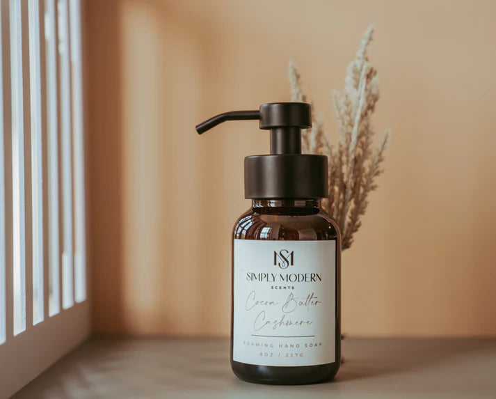 Simply Modern Cocoa Butter Cashmere Foaming Hand Soap in an amber glass 8-ounce bottle.