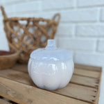 Simply Modern white glass pumpkin shaped candle in the scent Pumpkin Pecan Waffles.