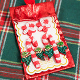 Simply Southern beaded candy cane drop earrings.