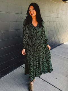 Floral printed long sleeve v-neck maxi dress in forest green.