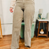 Corduroy snow washed olive wide leg high rise pants.