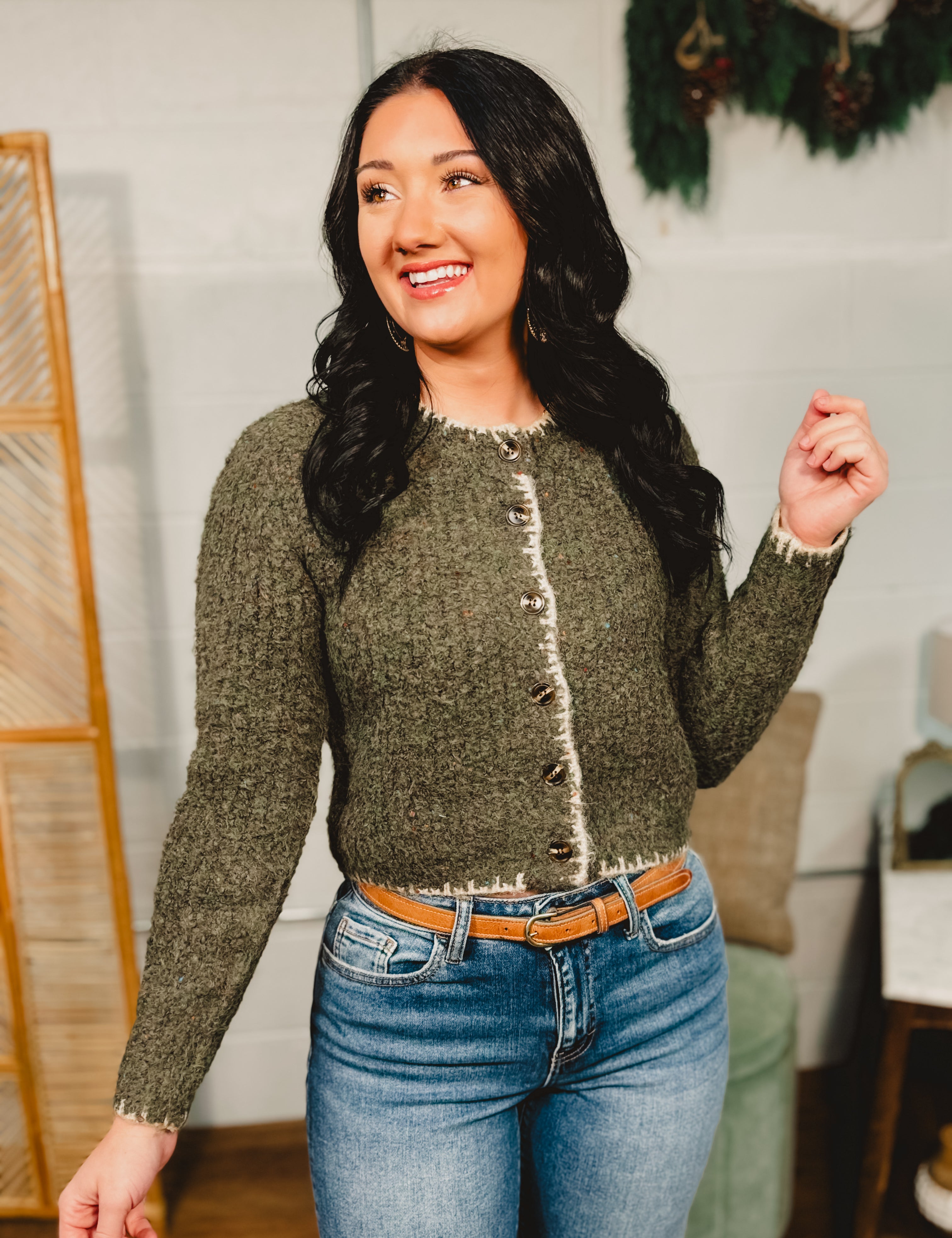 Speckled button down cardigan sweater top with contrast trim in olive.