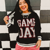 "Game Day" contrast trim long sleeved top in black.