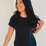 Soft rolled short sleeve rounded neckline top in black.