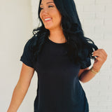 Soft rolled short sleeve rounded neckline top in black.