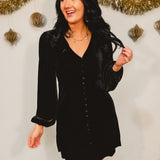 Velvet long sleeve v-neck button detail babydoll mini dress in black.