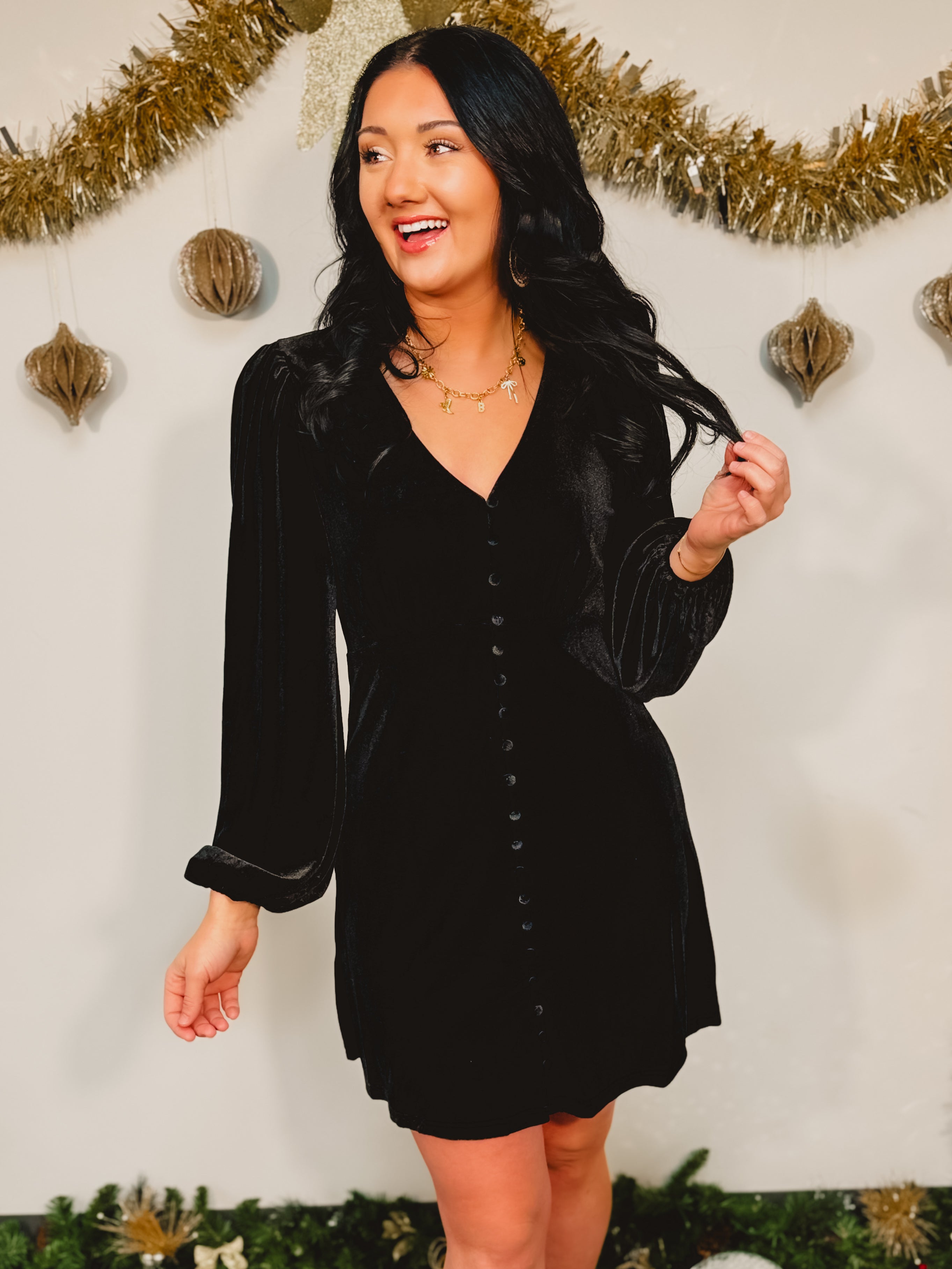 Velvet long sleeve v-neck button detail babydoll mini dress in black.