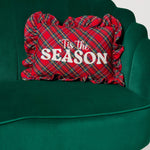 Tis the Season plaid ruffle pillow styled on a sofa